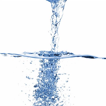 Crisp, clear, refreshing water against a white background. Fotografie stock - Microstock e Abbonamento, Codice: 400-05139016