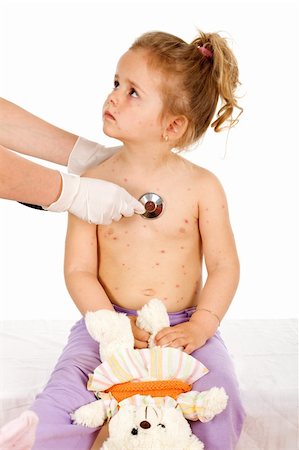 rubber nurse - Little girl with small pox consulted by a physician Stock Photo - Budget Royalty-Free & Subscription, Code: 400-05139095