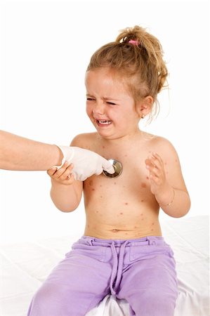 rubber nurse - Crying little girl with small pox consulted by a physician - isolated Stock Photo - Budget Royalty-Free & Subscription, Code: 400-05139097
