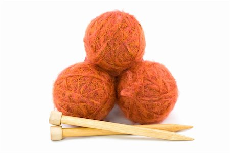 south12th (artist) - Three Balls of Orange Yarn with Wooden Knitting Needles Foto de stock - Super Valor sin royalties y Suscripción, Código: 400-05139214