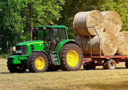 green tractor at work in field rural scene Stock Photo - Budget Royalty-Free & Subscription, Code: 400-05139866