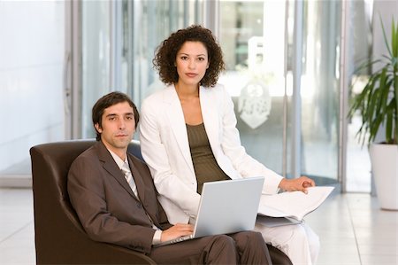 simsearch:400-05155599,k - portrait of business executives working on laptop Stock Photo - Budget Royalty-Free & Subscription, Code: 400-05130750