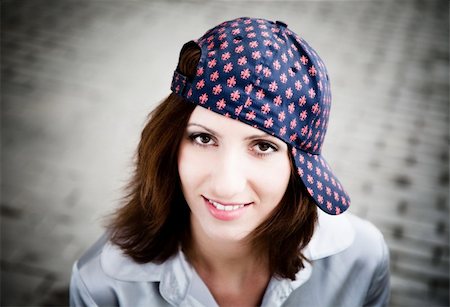 simsearch:400-04622088,k - Beauty Woman With Baseball Cap. Close-Up Portrait Stock Photo - Budget Royalty-Free & Subscription, Code: 400-05131120