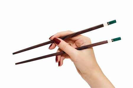 chopsticks in a hand; isolated on white Stock Photo - Budget Royalty-Free & Subscription, Code: 400-05131577