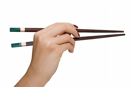 chopsticks in a hand; isolated on white Stock Photo - Budget Royalty-Free & Subscription, Code: 400-05131578
