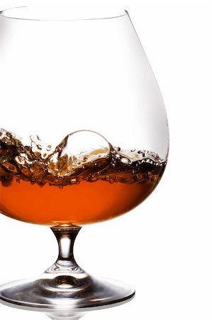 Snifter glass of cognac on white background. Stock Photo - Budget Royalty-Free & Subscription, Code: 400-05131675