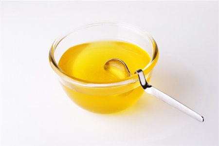 Thick sweet honey and into the small honey pot Stock Photo - Budget Royalty-Free & Subscription, Code: 400-05131682