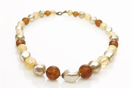 silves - Necklace with perl on bright background Photographie de stock - Aubaine LD & Abonnement, Code: 400-05132116