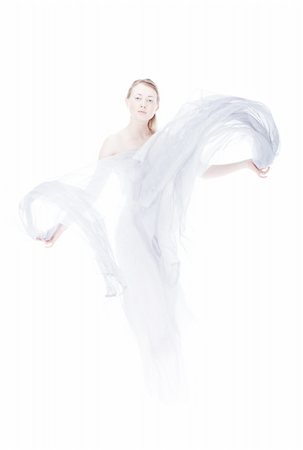 simsearch:400-04845191,k - Young woman waving by light fabric over white high key Foto de stock - Royalty-Free Super Valor e Assinatura, Número: 400-05132143