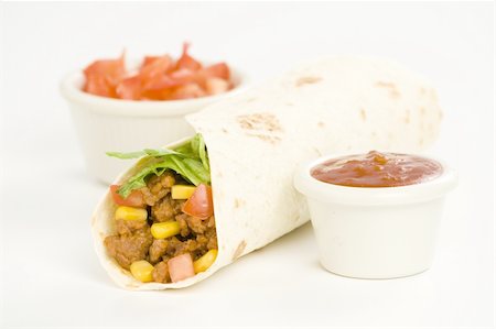 fajita - delicious fajitas beef lettuce tomato pepper corn isolated Foto de stock - Super Valor sin royalties y Suscripción, Código: 400-05132364