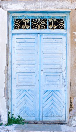 simsearch:400-07556220,k - A pair of old blue doors on a dissused building in Greece. Stock Photo - Budget Royalty-Free & Subscription, Code: 400-05133162