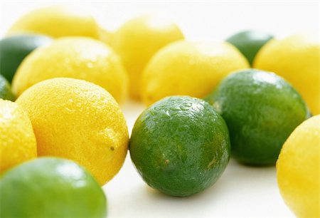 Lemon and lime on white background Photographie de stock - Aubaine LD & Abonnement, Code: 400-05133263