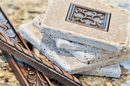 Ceramic tiles and borders for backsplash close up on a granite surface Stock Photo - Budget Royalty-Free & Subscription, Code: 400-05133477