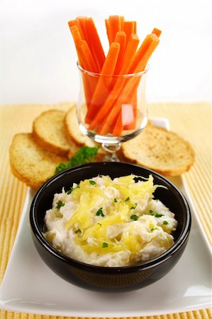simsearch:400-05255035,k - Pineapple ricotta spread with julienne carrots and crisp toasts. Stock Photo - Budget Royalty-Free & Subscription, Code: 400-05133721