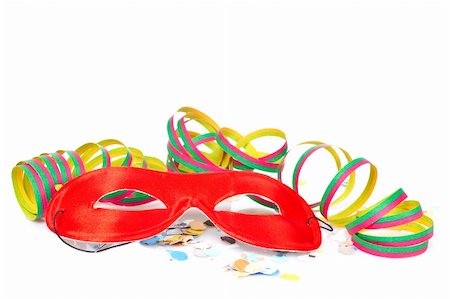 simsearch:400-04546218,k - Red mask, ribbons and confetti on white background. Shallow depth of field Stock Photo - Budget Royalty-Free & Subscription, Code: 400-05133903