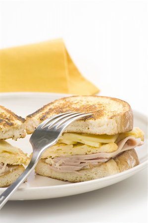 tasty sandwich of ham and cheese omelet isolated Stock Photo - Budget Royalty-Free & Subscription, Code: 400-05144112