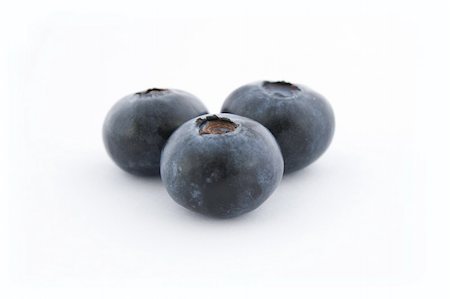 simsearch:400-08341539,k - Three blueberries isolated on white background, with shadow. Stockbilder - Microstock & Abonnement, Bildnummer: 400-05145111