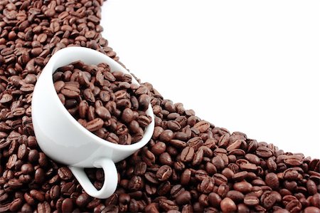 White cup filled with coffee beans Stock Photo - Budget Royalty-Free & Subscription, Code: 400-05146002