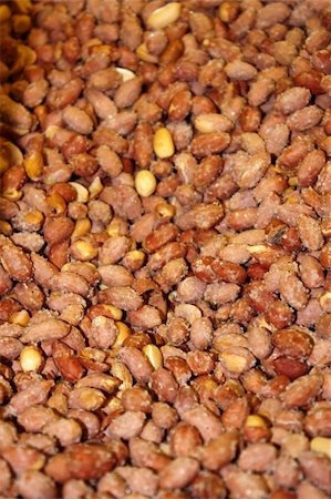 Salty peanuts  background - vertical Fotografie stock - Microstock e Abbonamento, Codice: 400-05146165