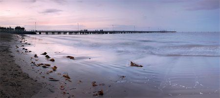 simsearch:400-07486187,k - The sunset light is fading over the long pier Foto de stock - Royalty-Free Super Valor e Assinatura, Número: 400-05146231