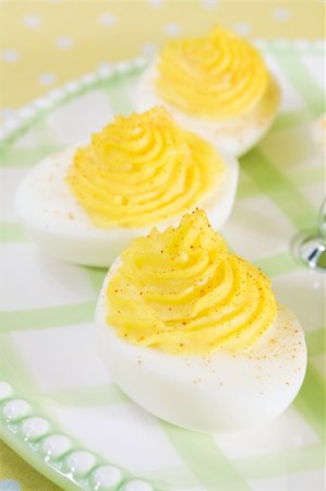 deviled egg - Deviled eggs sprinkled with paprika. Stock Photo - Budget Royalty-Free & Subscription, Code: 400-05146997