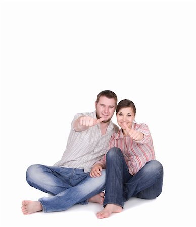 simsearch:400-04150404,k - happy young couple together on white background Stock Photo - Budget Royalty-Free & Subscription, Code: 400-05148019