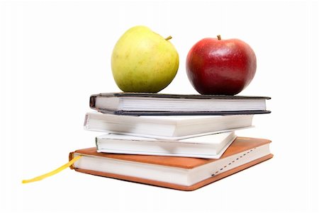 simsearch:400-05734056,k - "Back to school" concept with books and apples on white Photographie de stock - Aubaine LD & Abonnement, Code: 400-05148429