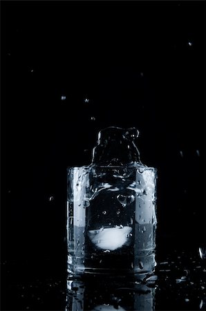 photograph chaotic table - Glass of splashing water Stock Photo - Budget Royalty-Free & Subscription, Code: 400-05149235