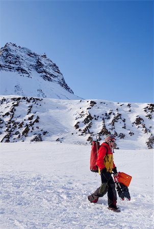 simsearch:400-05140122,k - A female mountaineer against a winter mountain landscape Photographie de stock - Aubaine LD & Abonnement, Code: 400-05140161