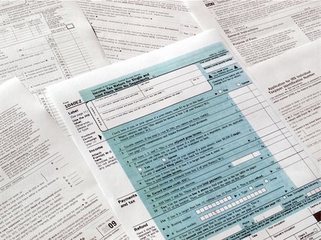 simsearch:400-05339747,k - Range of various blank USA tax forms Stock Photo - Budget Royalty-Free & Subscription, Code: 400-05140292