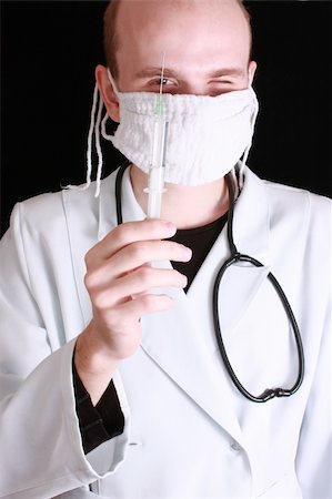 Young doctor with syringe Stock Photo - Budget Royalty-Free & Subscription, Code: 400-05141172