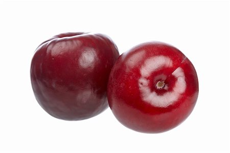 simsearch:400-04859130,k - Two fresh plums isolated on white background Photographie de stock - Aubaine LD & Abonnement, Code: 400-05141235