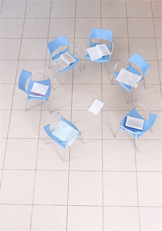 portable chair not people - chairs is a empty space with notebooks on top Stock Photo - Budget Royalty-Free & Subscription, Code: 400-05142611
