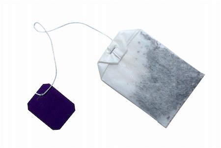 simsearch:400-05678542,k - Tea bag with violet tag isolated on white. Clipping path included. Foto de stock - Super Valor sin royalties y Suscripción, Código: 400-05143118