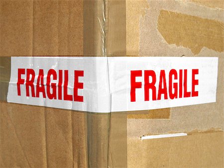 Detail of a fragile corrugated cardboard packet Stock Photo - Budget Royalty-Free & Subscription, Code: 400-05143222