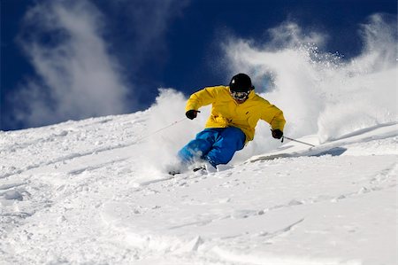 simsearch:400-04811318,k - Freeride skier in powder snow against blue sky. Stock Photo - Budget Royalty-Free & Subscription, Code: 400-05143266