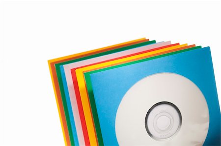 Multiple disc sleeves, standing on a clean background with a disc showing in the first window. Stock Photo - Budget Royalty-Free & Subscription, Code: 400-05143589