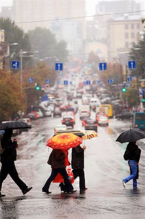 rainy street scene - urban people cross the street on the rain Stock Photo - Budget Royalty-Free & Subscription, Code: 400-05143812