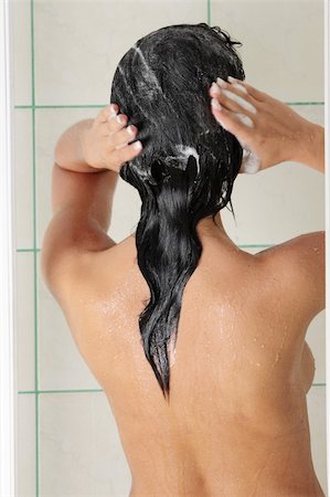 simsearch:6109-06195739,k - Young woman in shower washing her hairs Foto de stock - Super Valor sin royalties y Suscripción, Código: 400-05154067