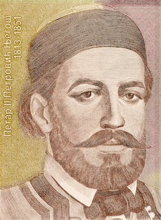 simsearch:400-05224752,k - Petar II Petrovic on 1000 Dinara 1994 Banknote from Yugoslavia. Serbian poet and orthodox prince-bishop of Montenegro and ruler that transformed Montenegro from a theocracy into a secular state. Stock Photo - Budget Royalty-Free & Subscription, Code: 400-05154551