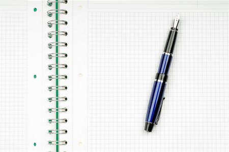 simsearch:700-02371495,k - close up of notebook and pencil on white background with clipping path Stock Photo - Budget Royalty-Free & Subscription, Code: 400-05154925