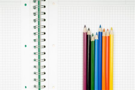simsearch:700-02371495,k - close up of notebook and pencil on white background with clipping path Stock Photo - Budget Royalty-Free & Subscription, Code: 400-05154926