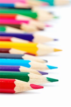 simsearch:400-03947012,k - Assortment of coloured pencils with shadow on white background. Shallow depth of field Stock Photo - Budget Royalty-Free & Subscription, Code: 400-05155260