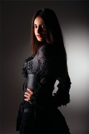 simsearch:400-05185838,k - Beautiful European woman. She's wearing corset Foto de stock - Royalty-Free Super Valor e Assinatura, Número: 400-05155460