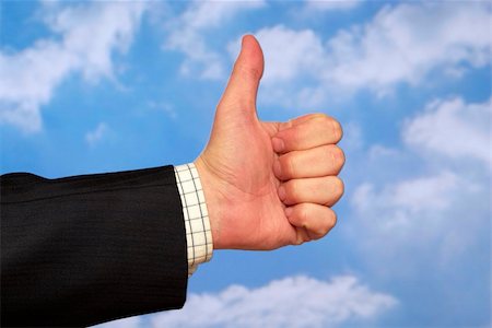 simsearch:400-05700994,k - Thumb up gesture over sky and clouds backgound Stock Photo - Budget Royalty-Free & Subscription, Code: 400-05155658