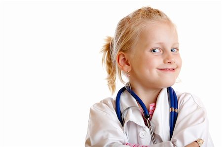 female doctor costume - Young child is playing doctor with uniform and stethoscope on white background Stock Photo - Budget Royalty-Free & Subscription, Code: 400-05155684
