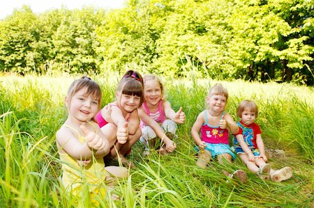 simsearch:400-05694035,k - Cute little girls sitting in the park Stock Photo - Budget Royalty-Free & Subscription, Code: 400-05155714