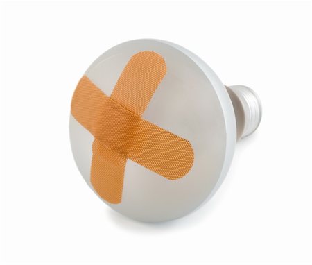 danilin (artist) - light bulb with band-aid isolated on white background Fotografie stock - Microstock e Abbonamento, Codice: 400-05155924