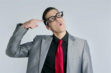 simsearch:400-04688299,k - Businessman crazy with funny glasses and suit on gray background Stock Photo - Budget Royalty-Free & Subscription, Code: 400-05155975