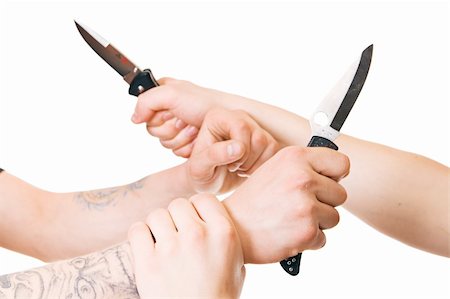 people in ready for fight - Men's hands with knife isolated on white background. Stock Photo - Budget Royalty-Free & Subscription, Code: 400-05156197